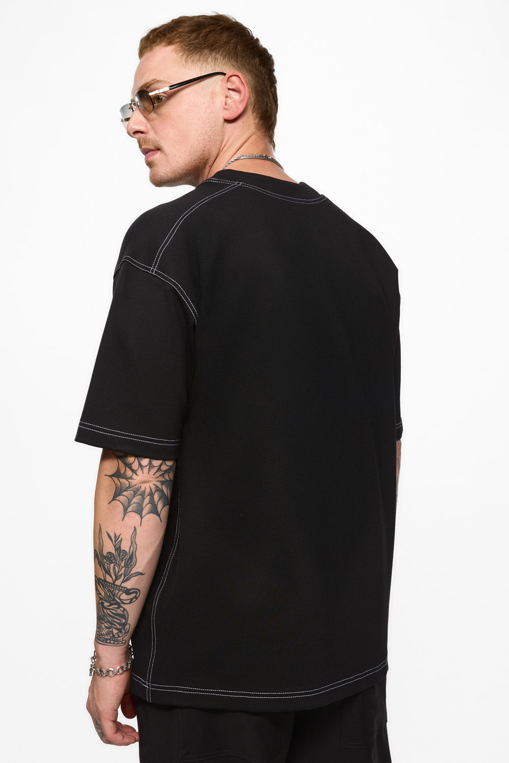 Khan Black T-shirt with decorative stitching