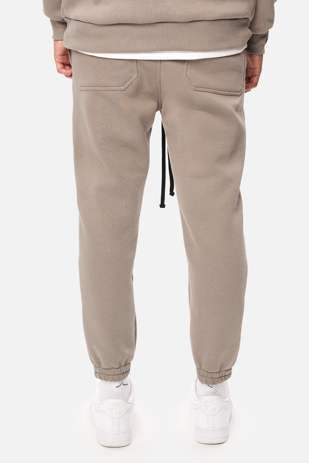 Pantaloni flausati cu broderie "Serotonin" | Bărbați | Bej | Stil Modern & Elegant | Confort & Funcționalitate | Atelier Hamza