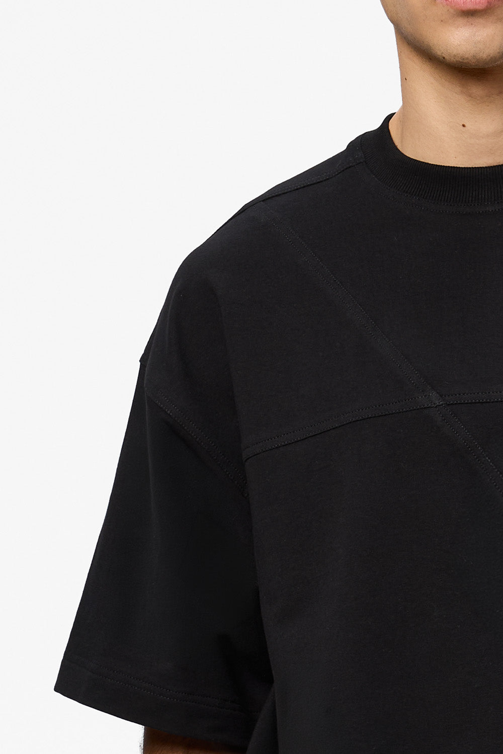 Oversized black T-shirt with decorative stitches
