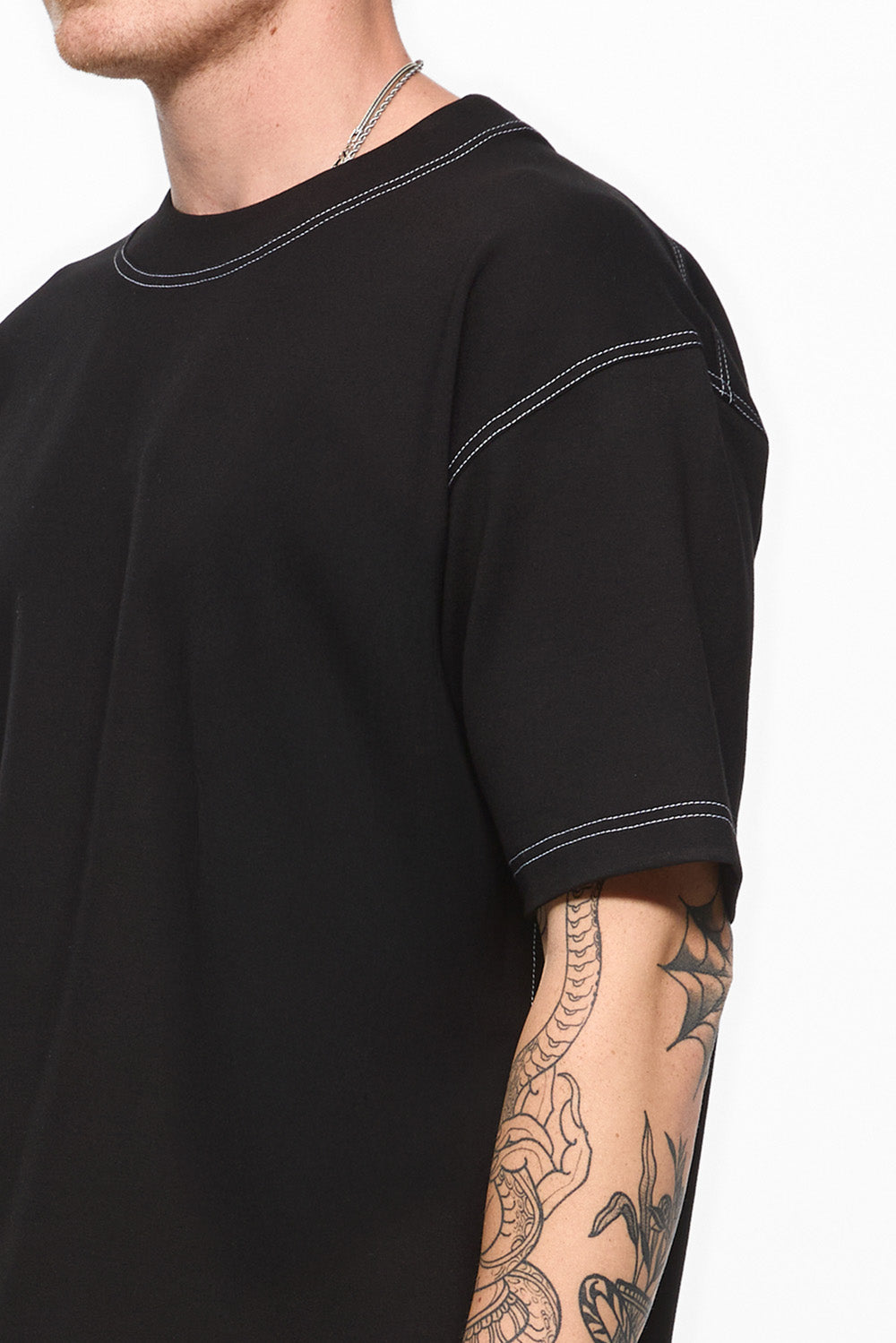 Khan Black T-shirt with decorative stitching